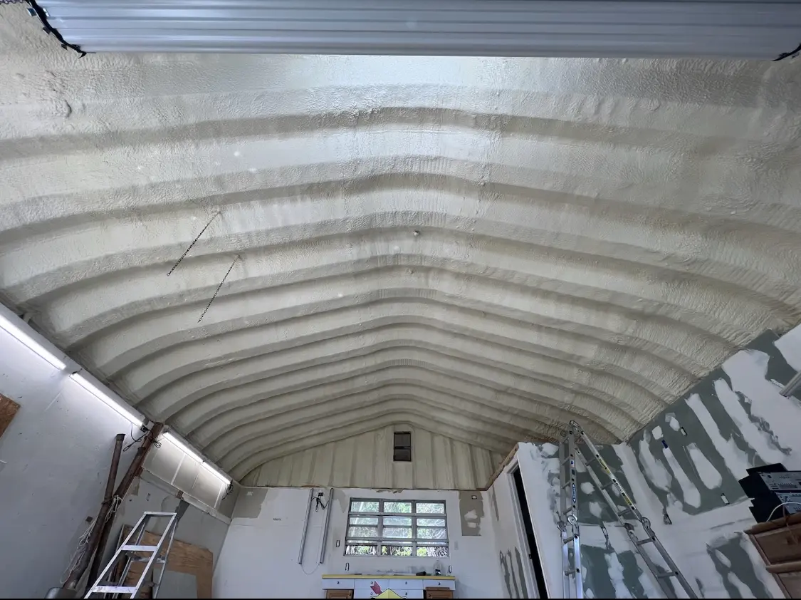 Spray polyurethane foam applied to the underside of a metal roof deck in Asbury Park