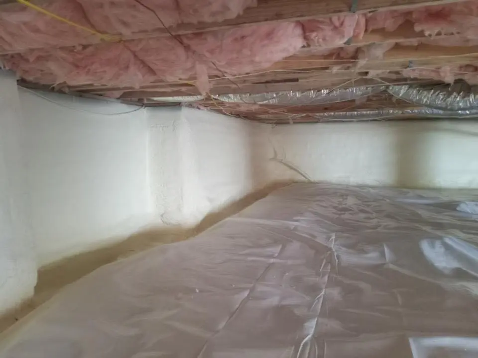 Crawl space encapsulation with closed-cell spray foam for Commercial Roof Restoration in Asbury Park
